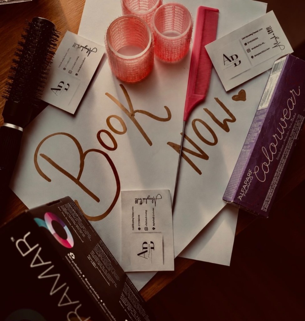 Hair tools and a book now card